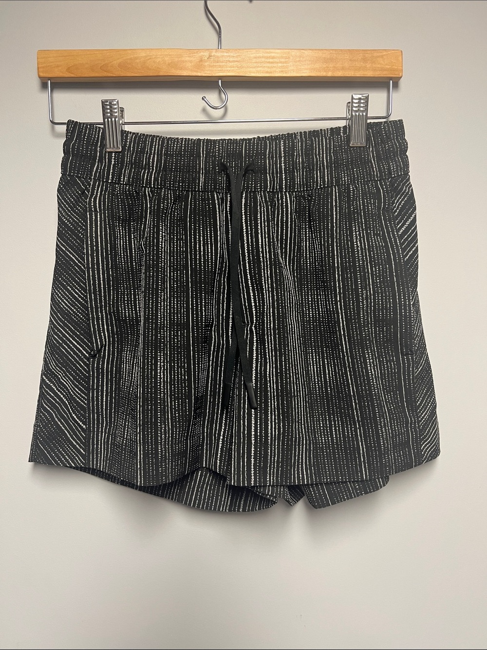 Athleta Black Shorts with White Pinstripe Detail